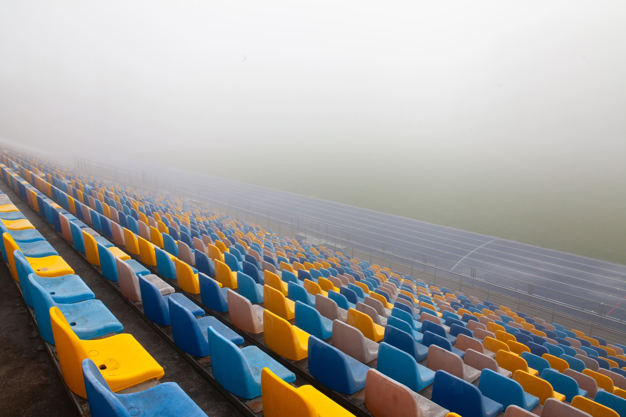 Football stadium in the morning fog