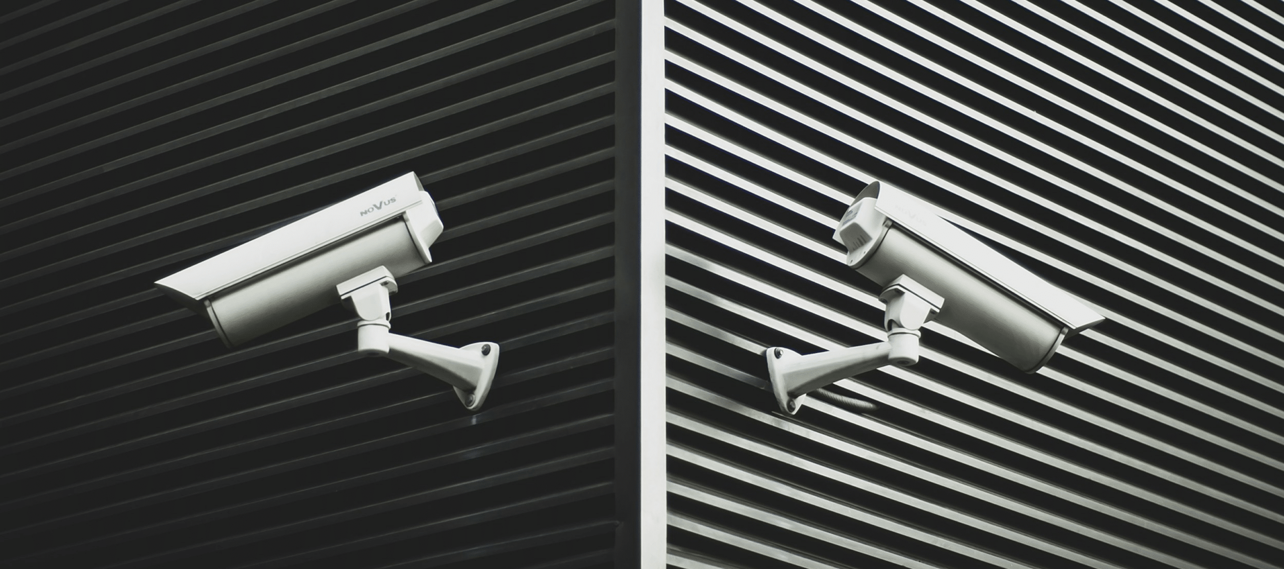 exterior view of building with mounted security cameras